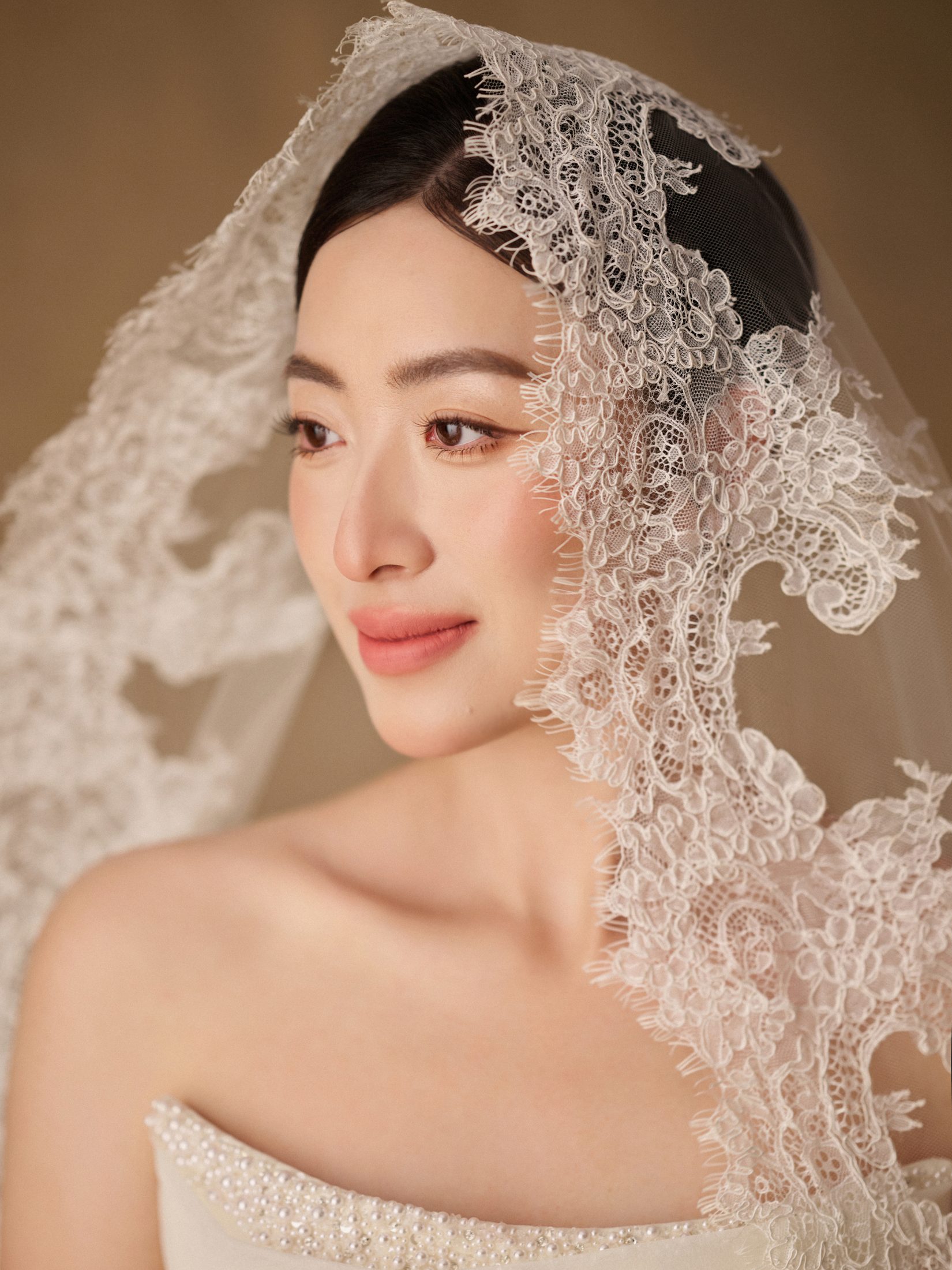 Lucy in her lace veil